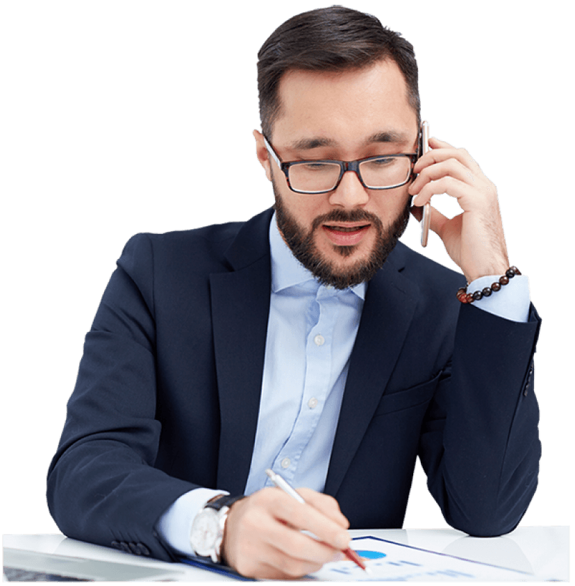Insurance agent on a call reviewing documents